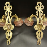 Pair of sconces with the heads of Zephyr Louis XVI style