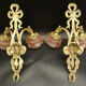 Pair of sconces with the heads of Zephyr Louis XVI style