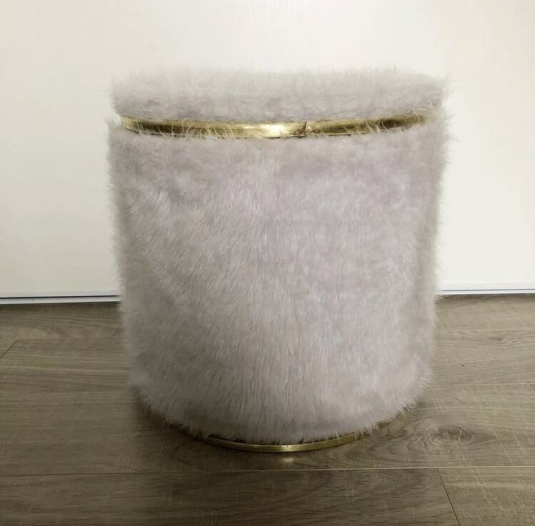 Vintage brass pouf with fur.