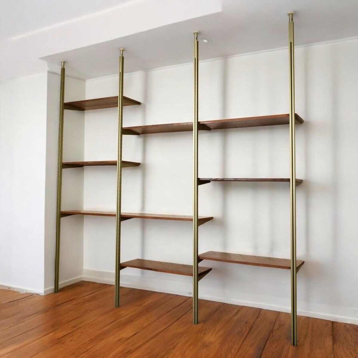 Tension pole free standing rose gold aluminum Omni wall unit by George Nelson