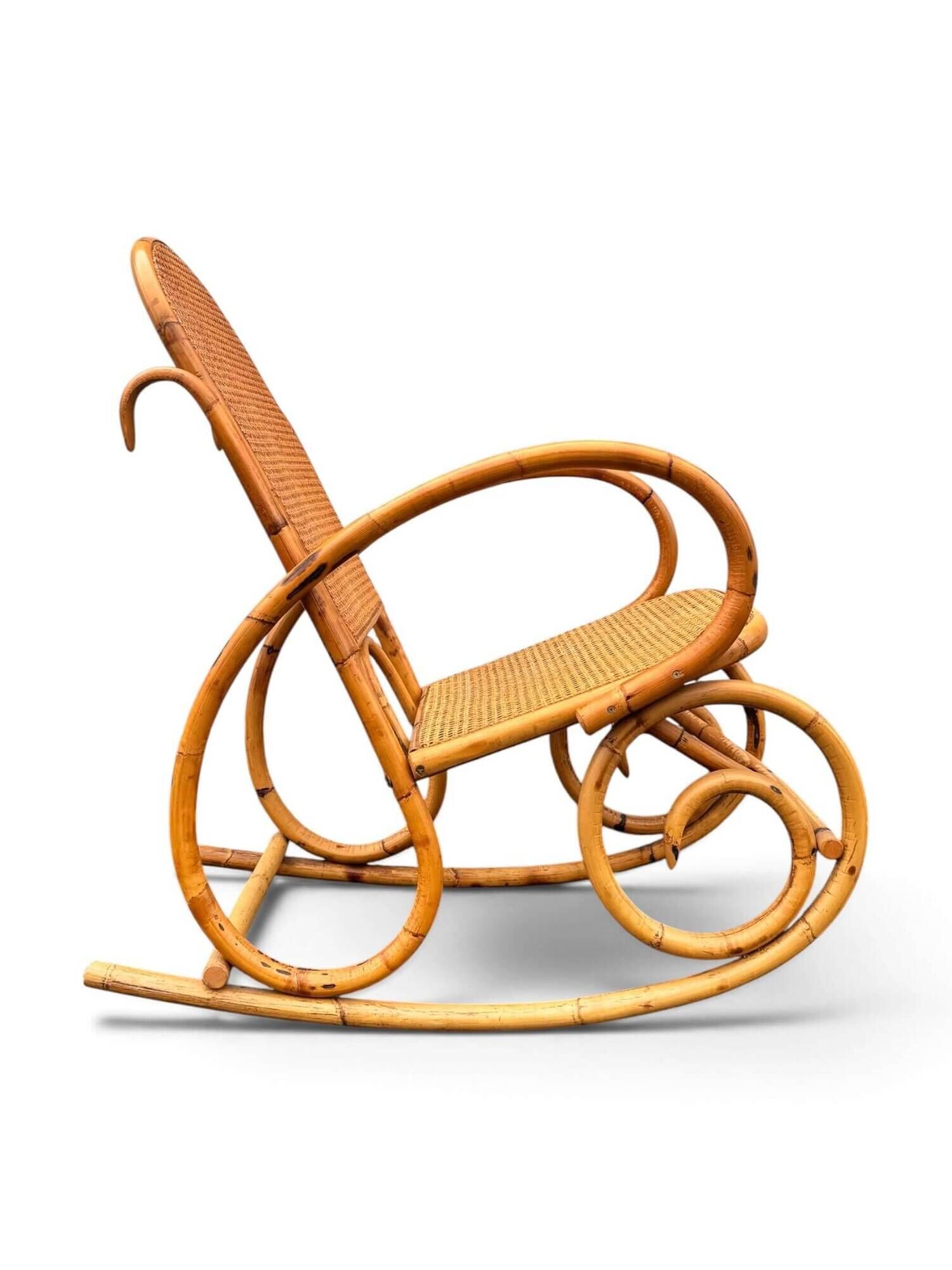 Vintage rocking chair in bamboo and cane