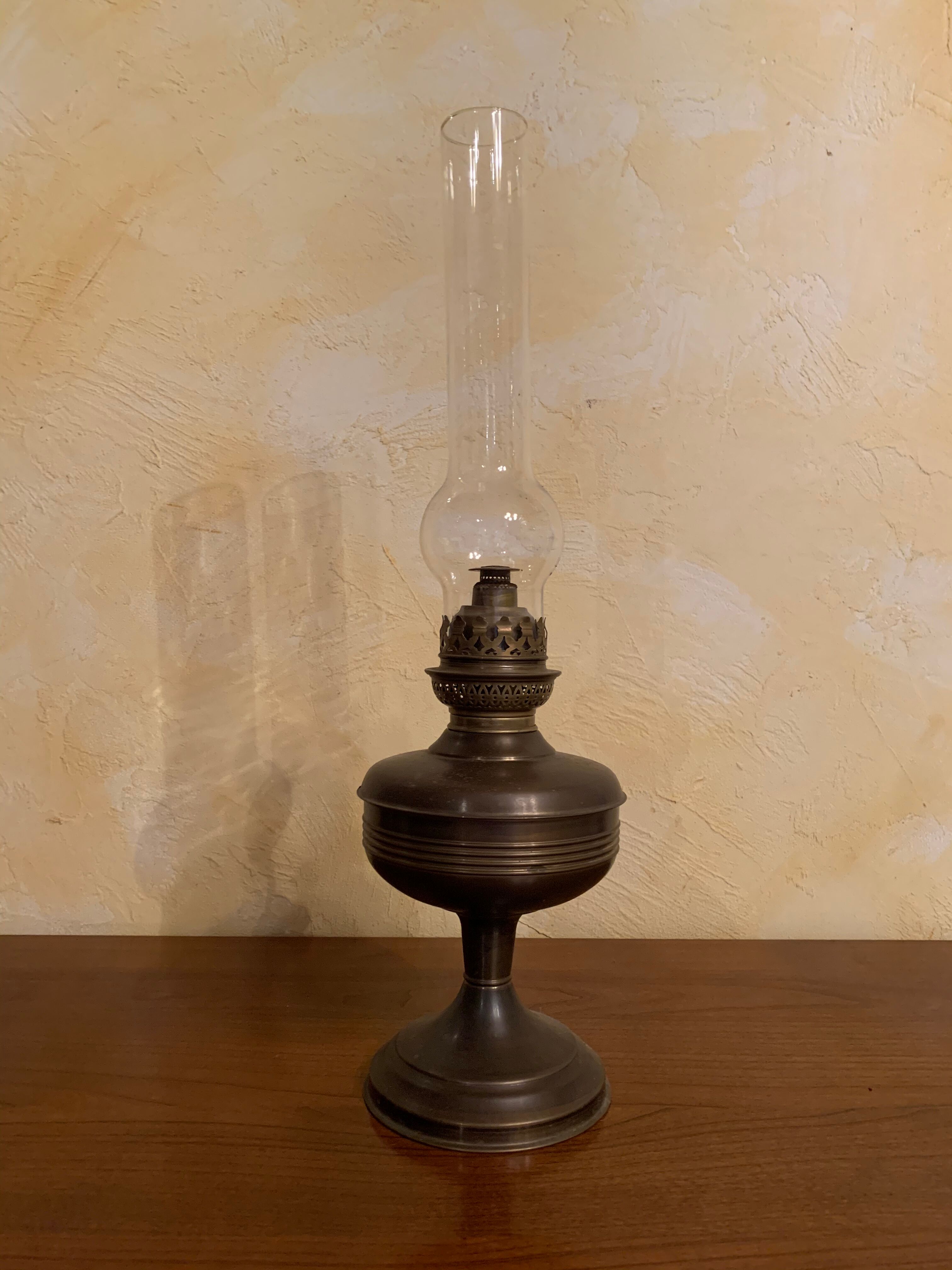Brass oil lamp and glass
