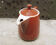 Old brown ceramic coffee maker