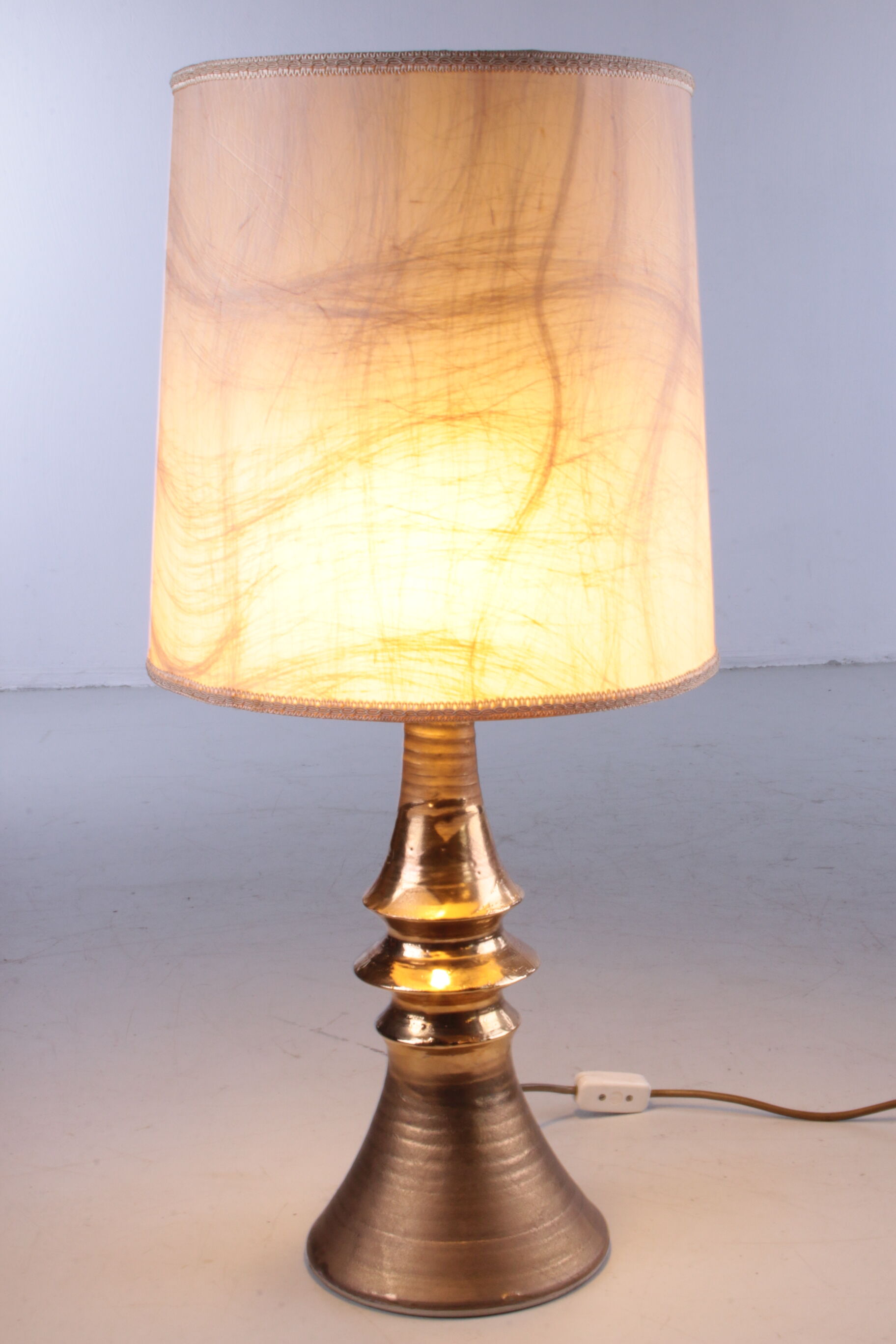 Ceramic gold table lamp with original shade, 70s