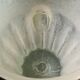 Beige fluted ear-shaped glass paste bucket