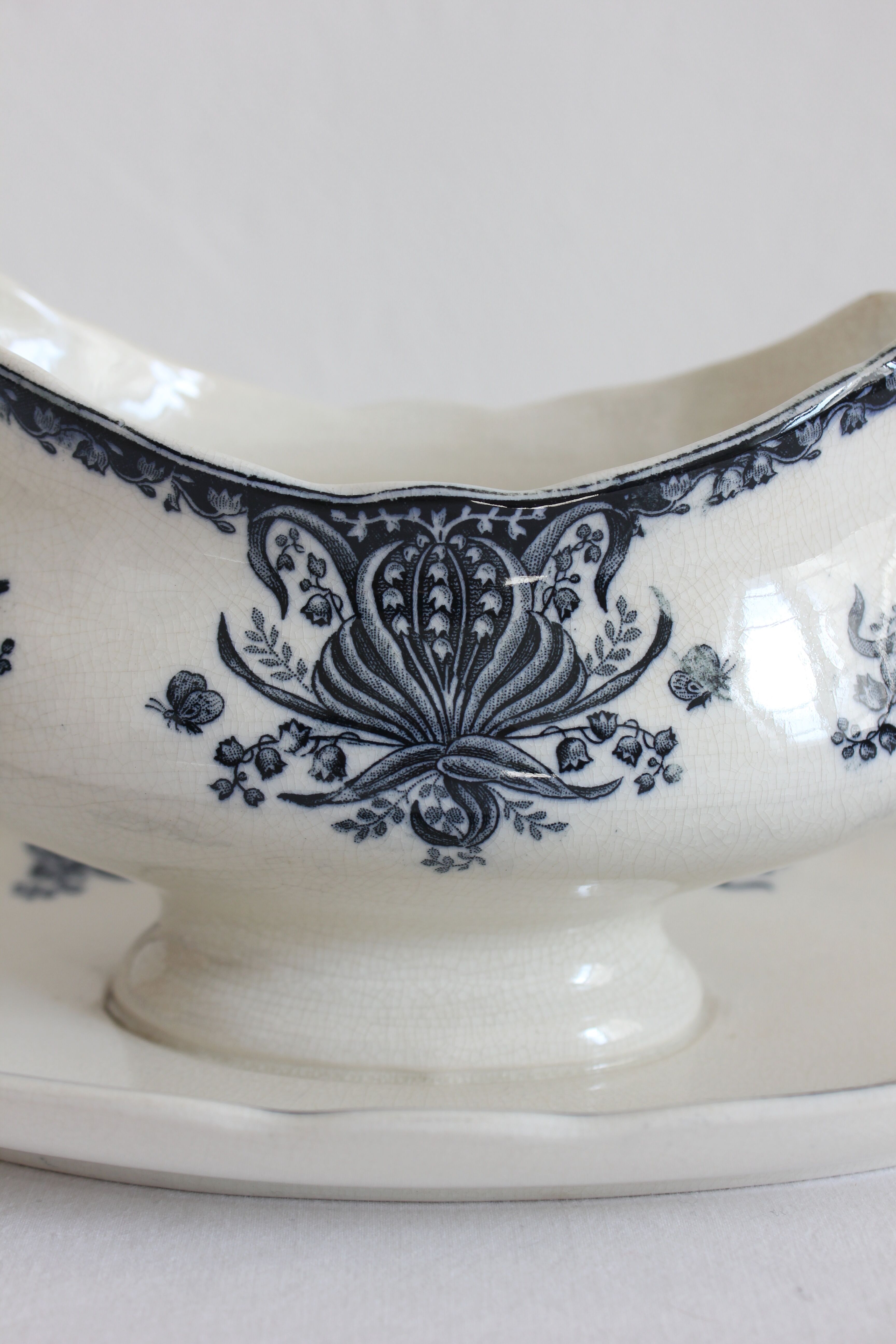 Ironware sauce boat with blue palmette decoration