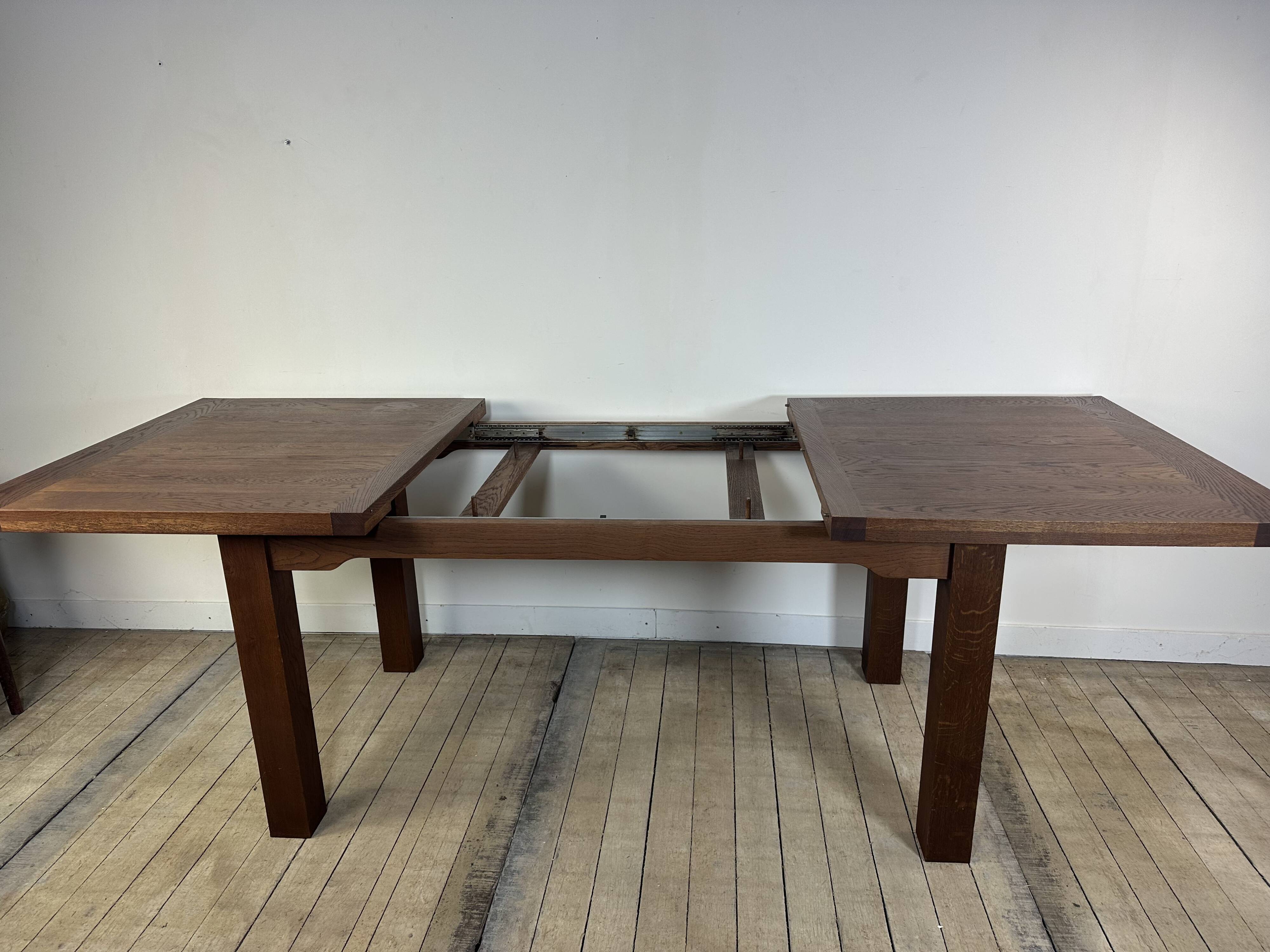 Brutalist solid oak table with 2 extensions from the 1990s.
