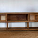 Vintage oak sideboard TV unit with raw finish and caning.