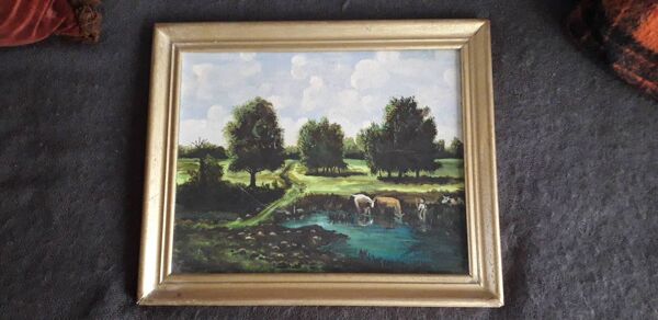 Tableau ancien représentant un paysage de campagne