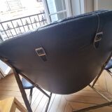 Black and golden bronze designer armchair