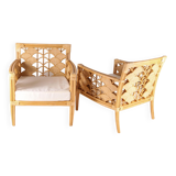 Pair of rattan armchairs with fan patterns