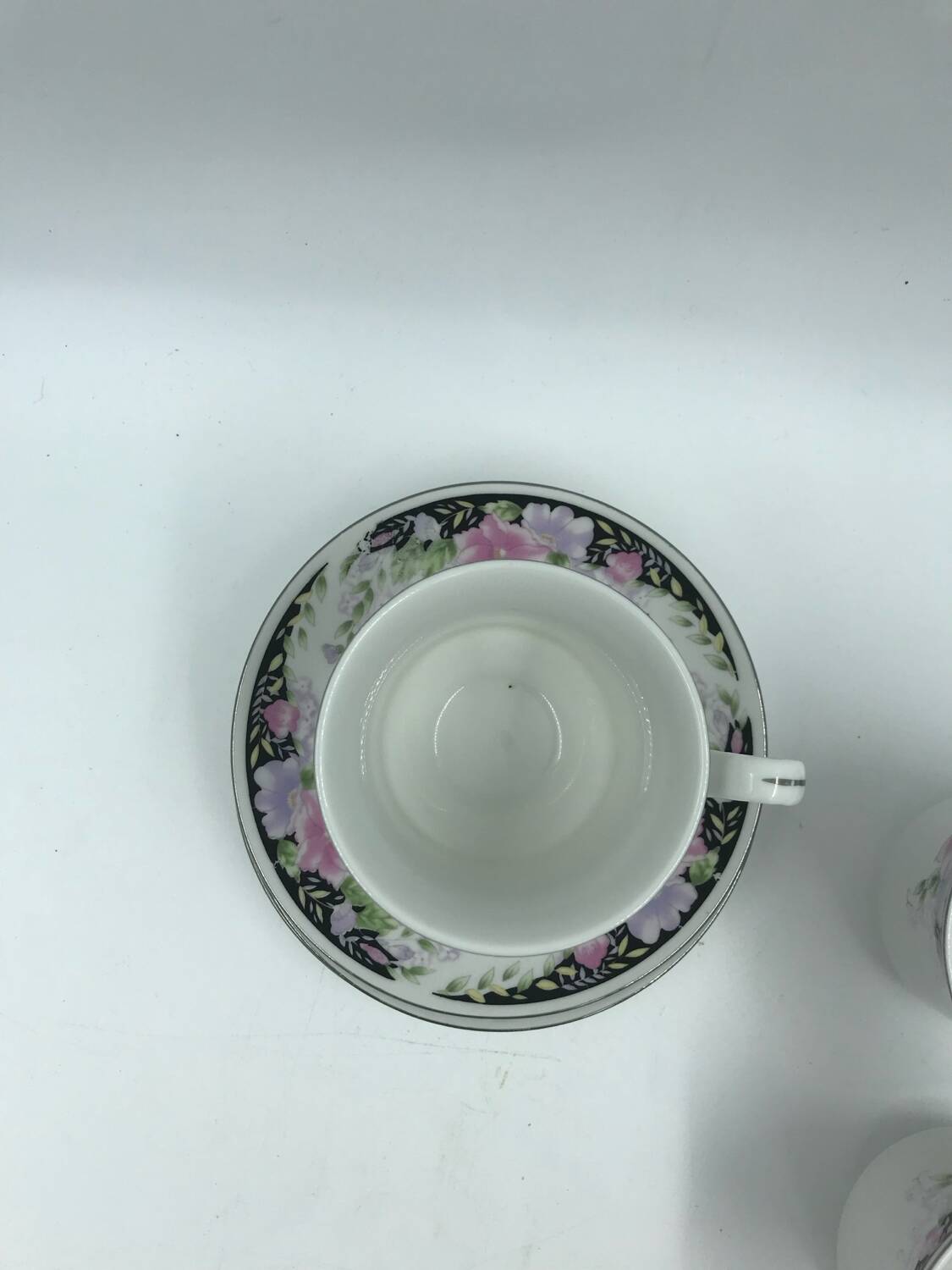 3 large cups and saucers