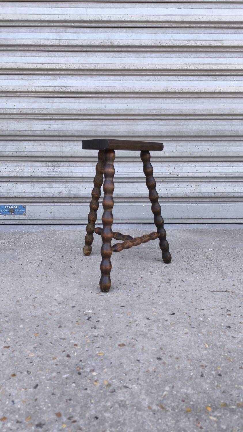 Turned wooden tripod stool
