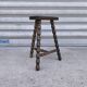 Turned wooden tripod stool