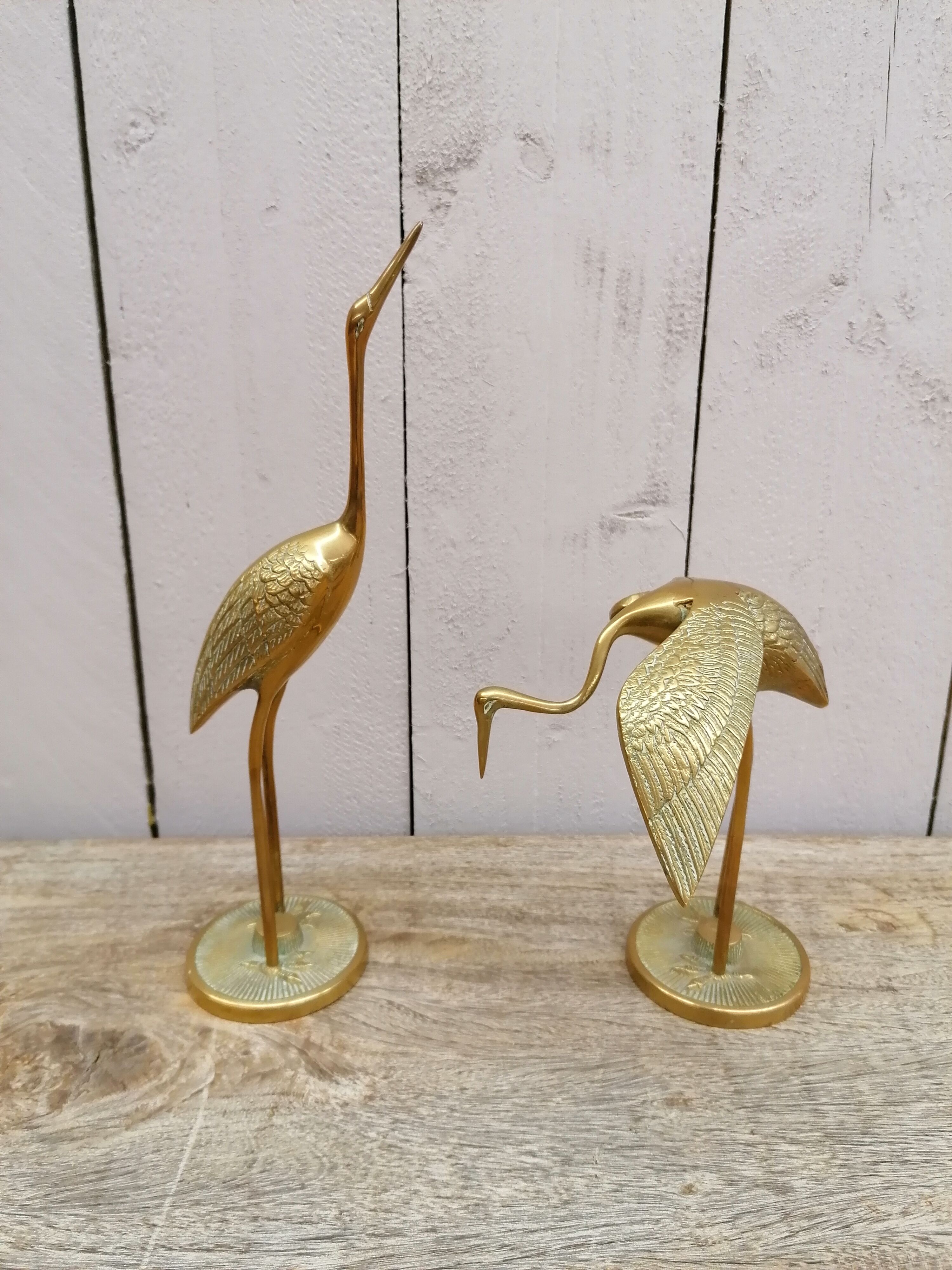 Pair of brass herons
