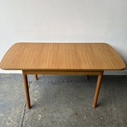 Mid-Century modern extending dining table by Schreiber Furniture
