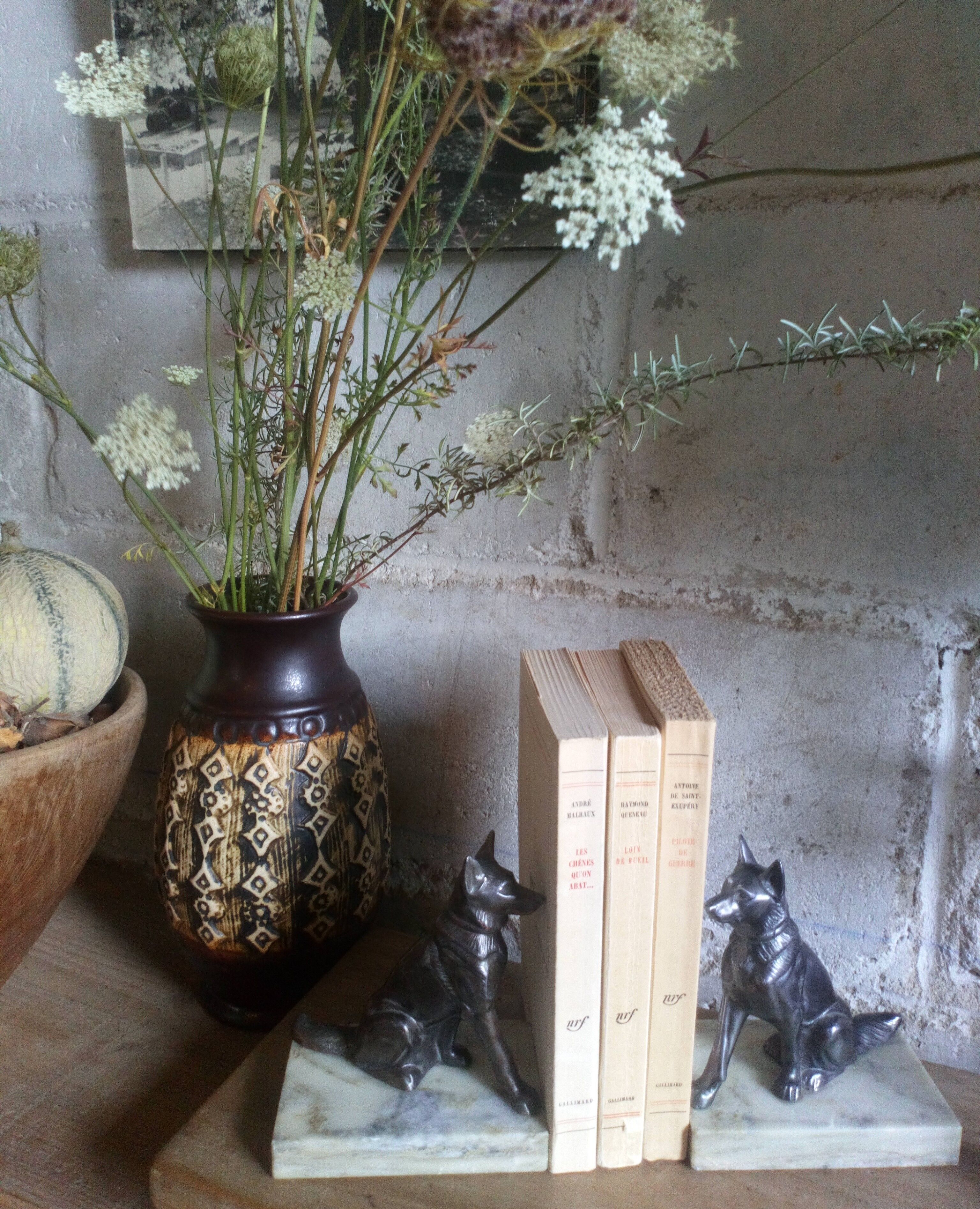 Pair of Art Deco bookends to signed wolf dogs