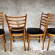 Set of 4 vintage wooden chairs with faux leather.