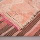 Tapis marocain vintage en laine rose