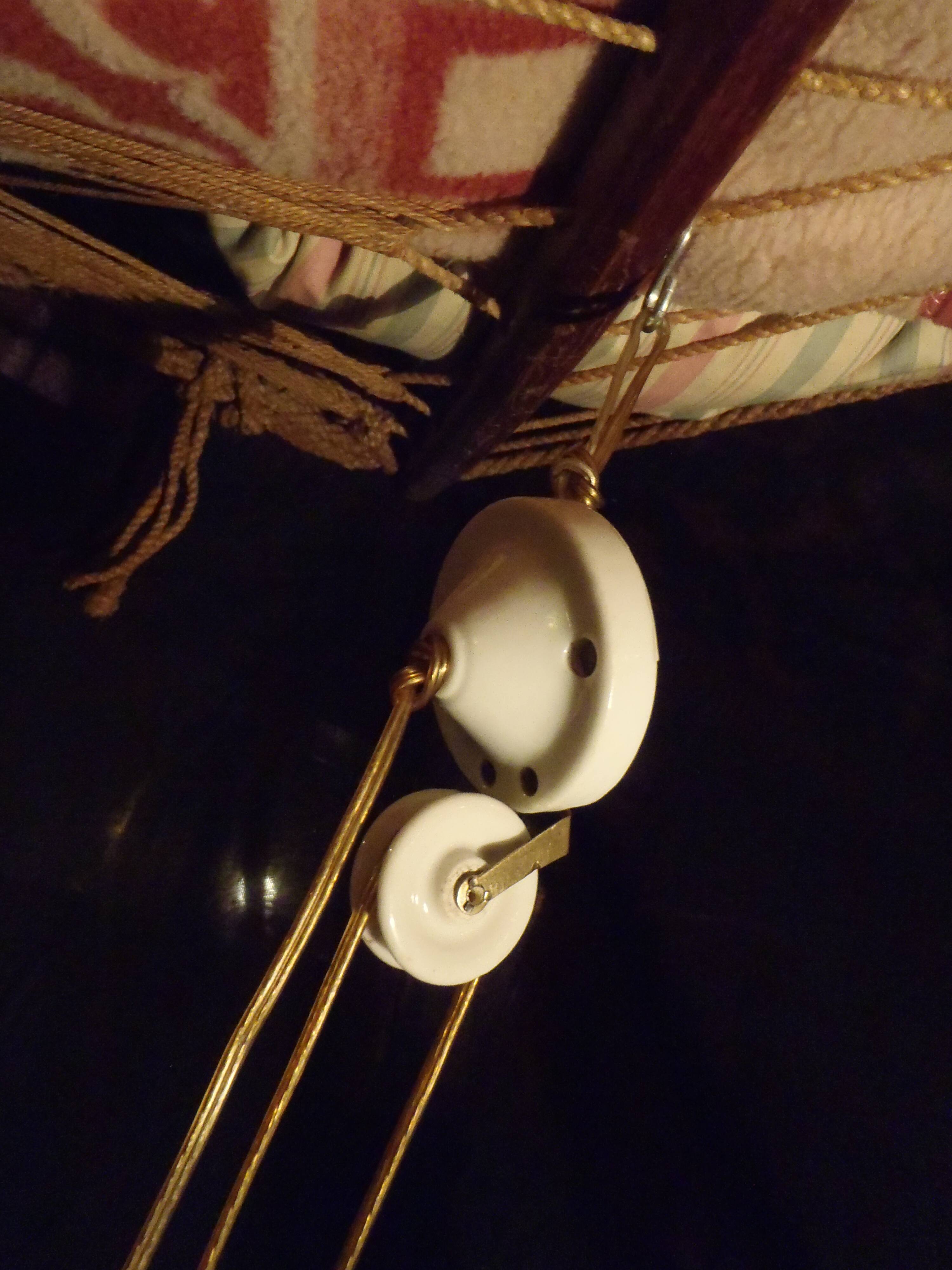 1930s brass "up and down" suspension
