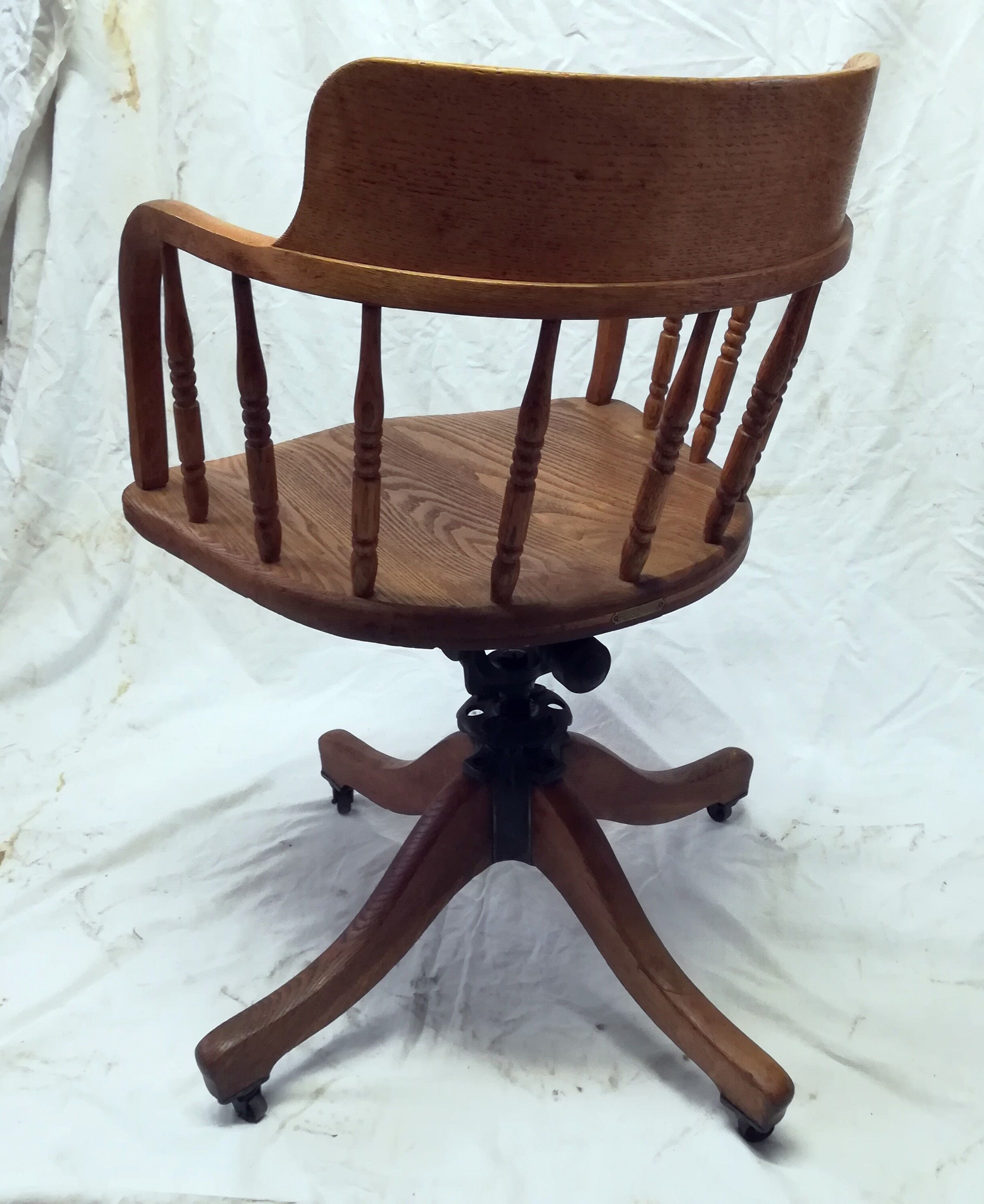 Adjustable swivel American armchair 1900