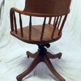 Adjustable swivel American armchair 1900
