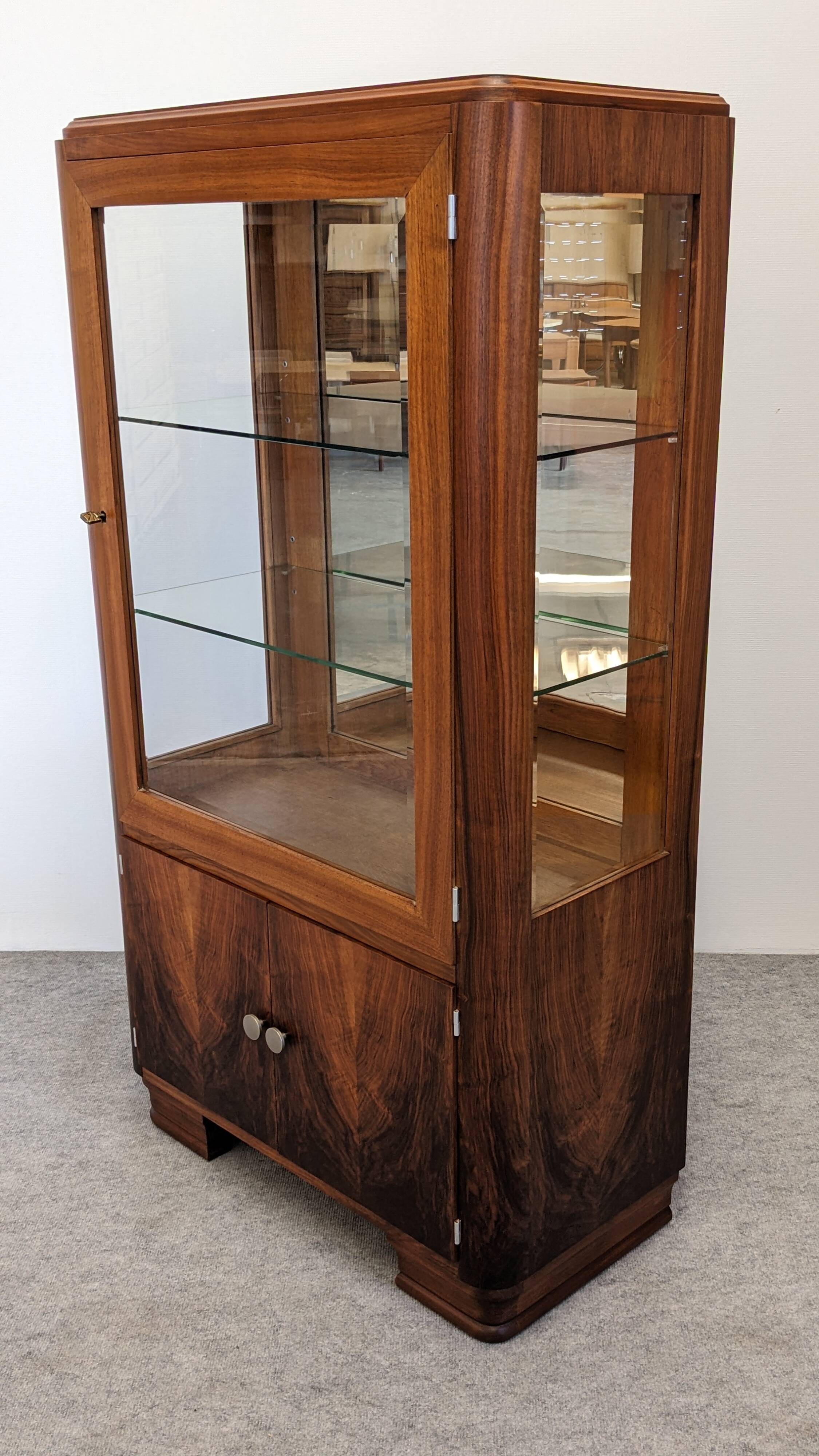 Art Deco walnut burl display cabinet, France circa 1930.