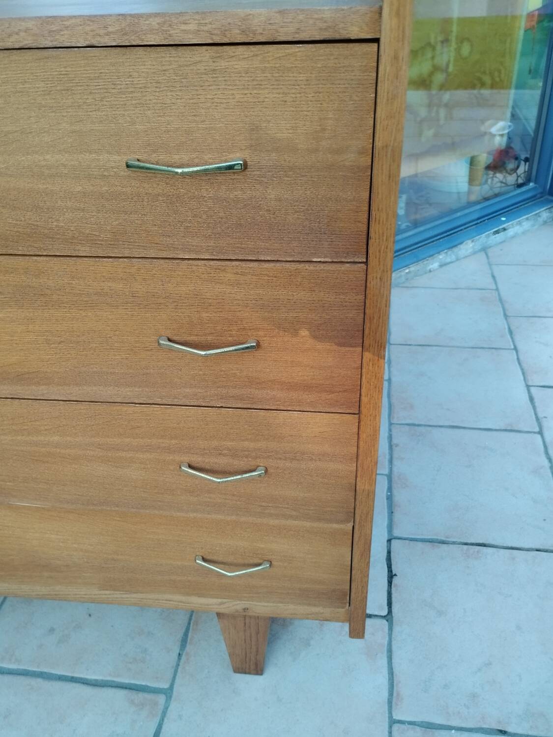Old vintage chest of drawers with compass feet