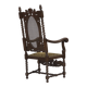 Fauteuil danois à haut dossier des années 1930, en maille, velours et bois de chêne sculpté.