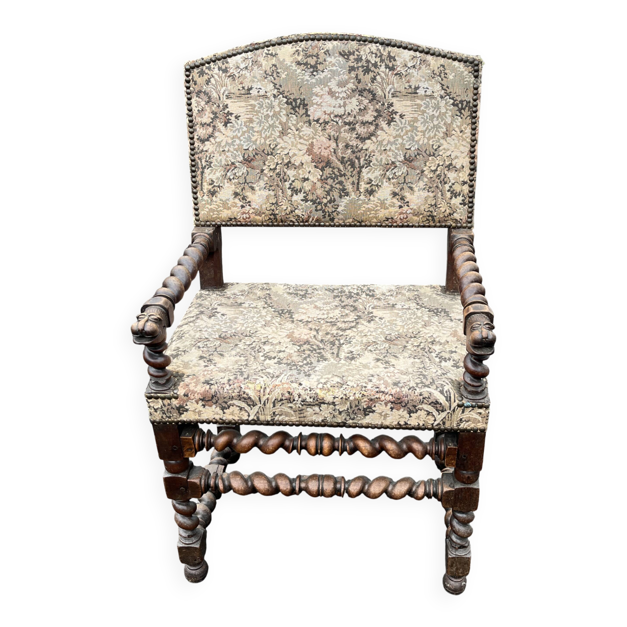 Louis XIII style armchair with twisted backrest and legs.