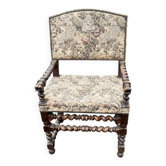 Louis XIII style armchair with twisted backrest and legs.