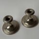 Antique silver-plated metal candlesticks