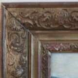 Painting on old panel framed and signed, cow and farmer