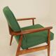 Scandinavian modern chair in green wool, vintage wooden armchair.