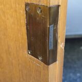 Half-moon commode in burl wood with a marble top.