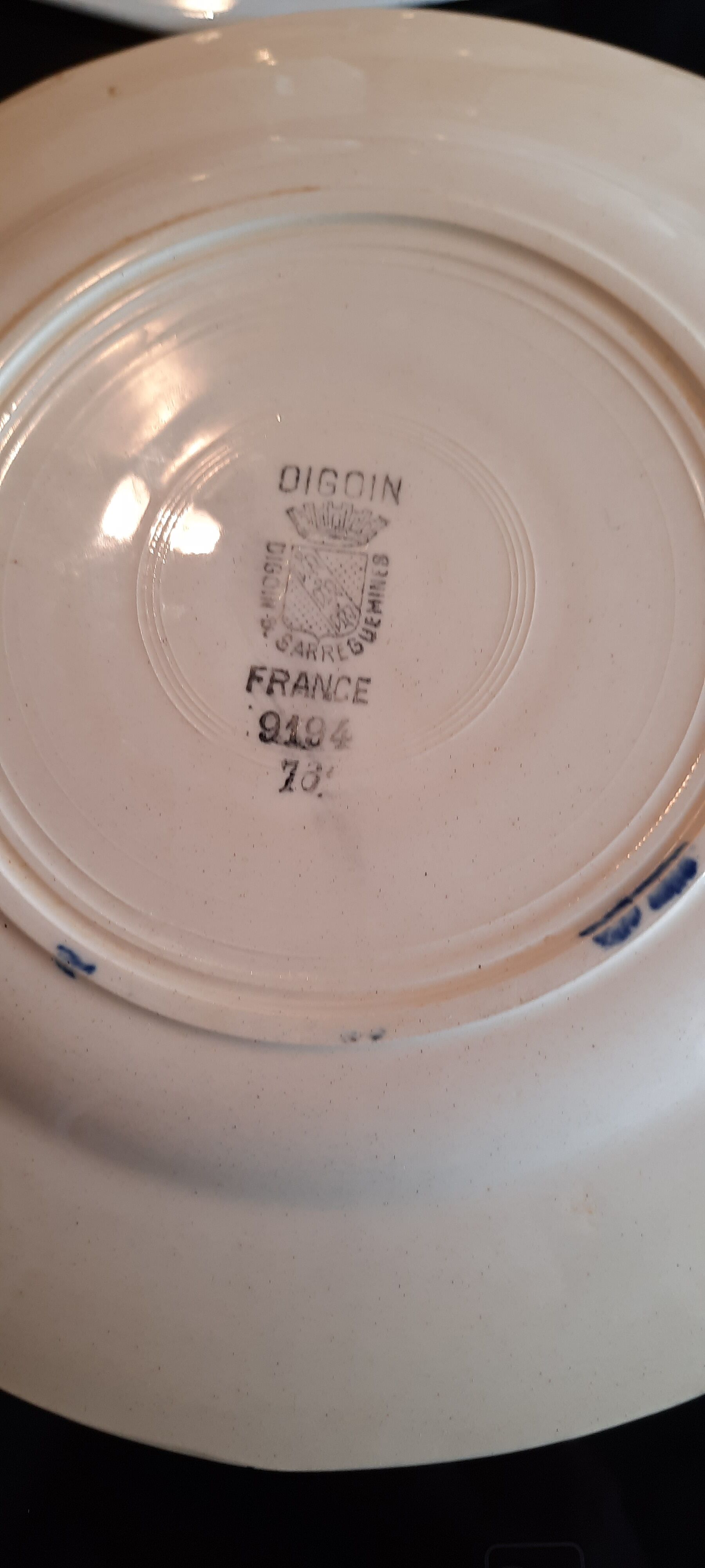 Old flat faience plates