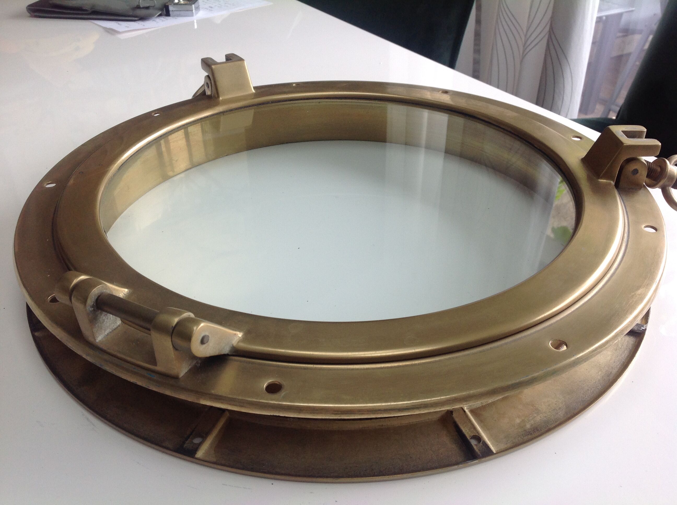 Brass opening partition window