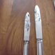 23 silver metal knives