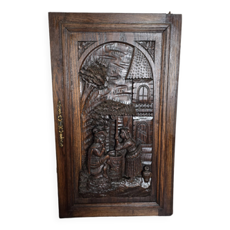 Ancienne porte en bois sculpté en chêne