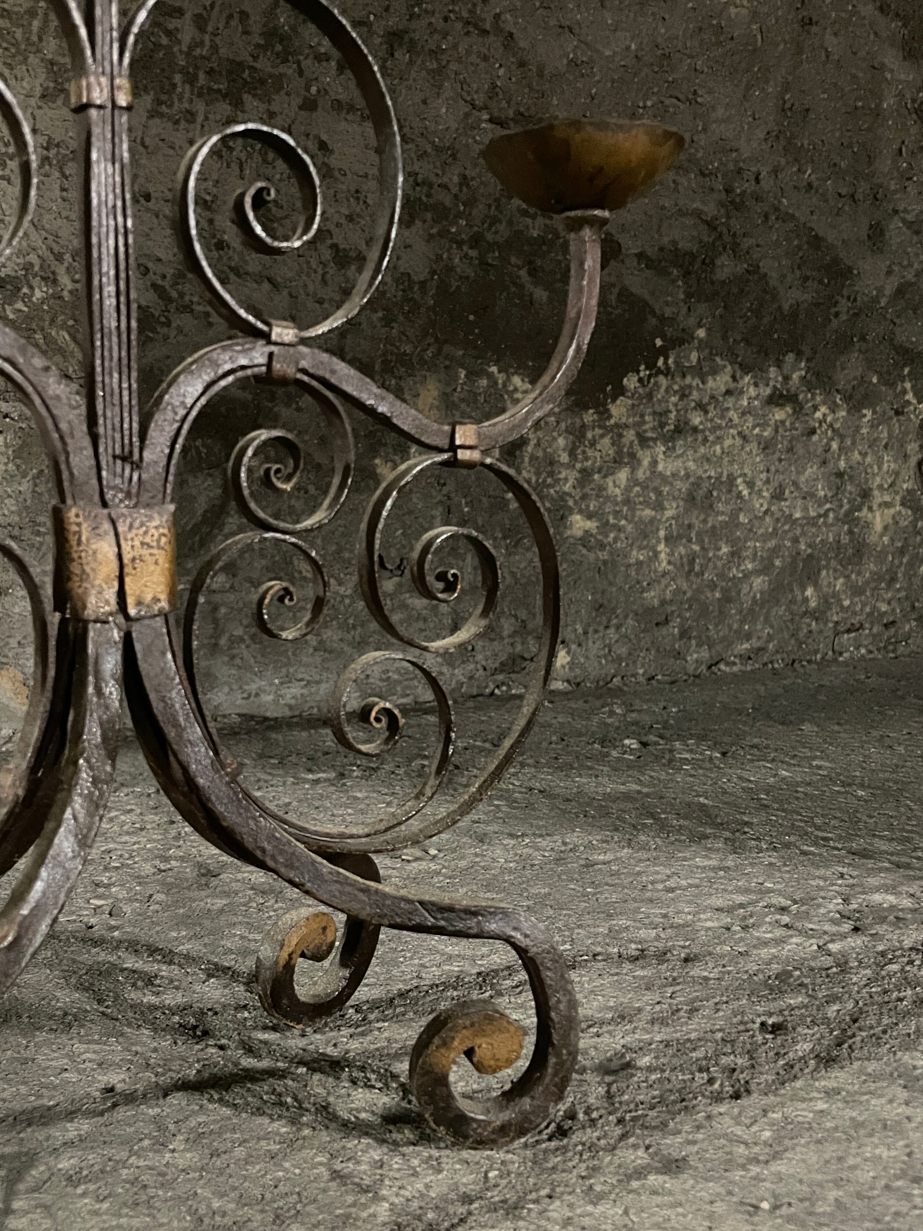 Pair of French wrought iron candelabra from the 19th century.