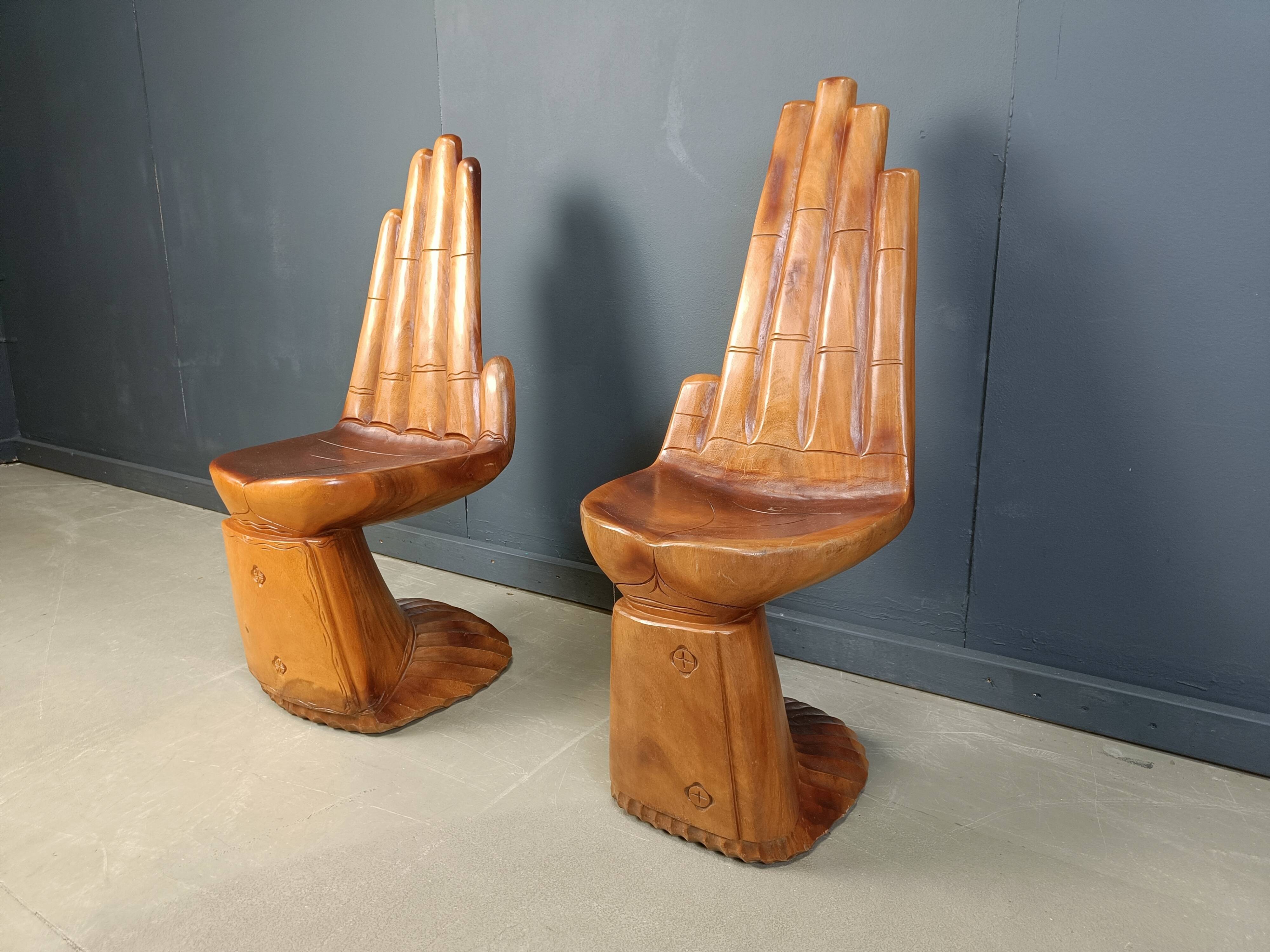 Pair of hand shaped teak chairs, 1970s