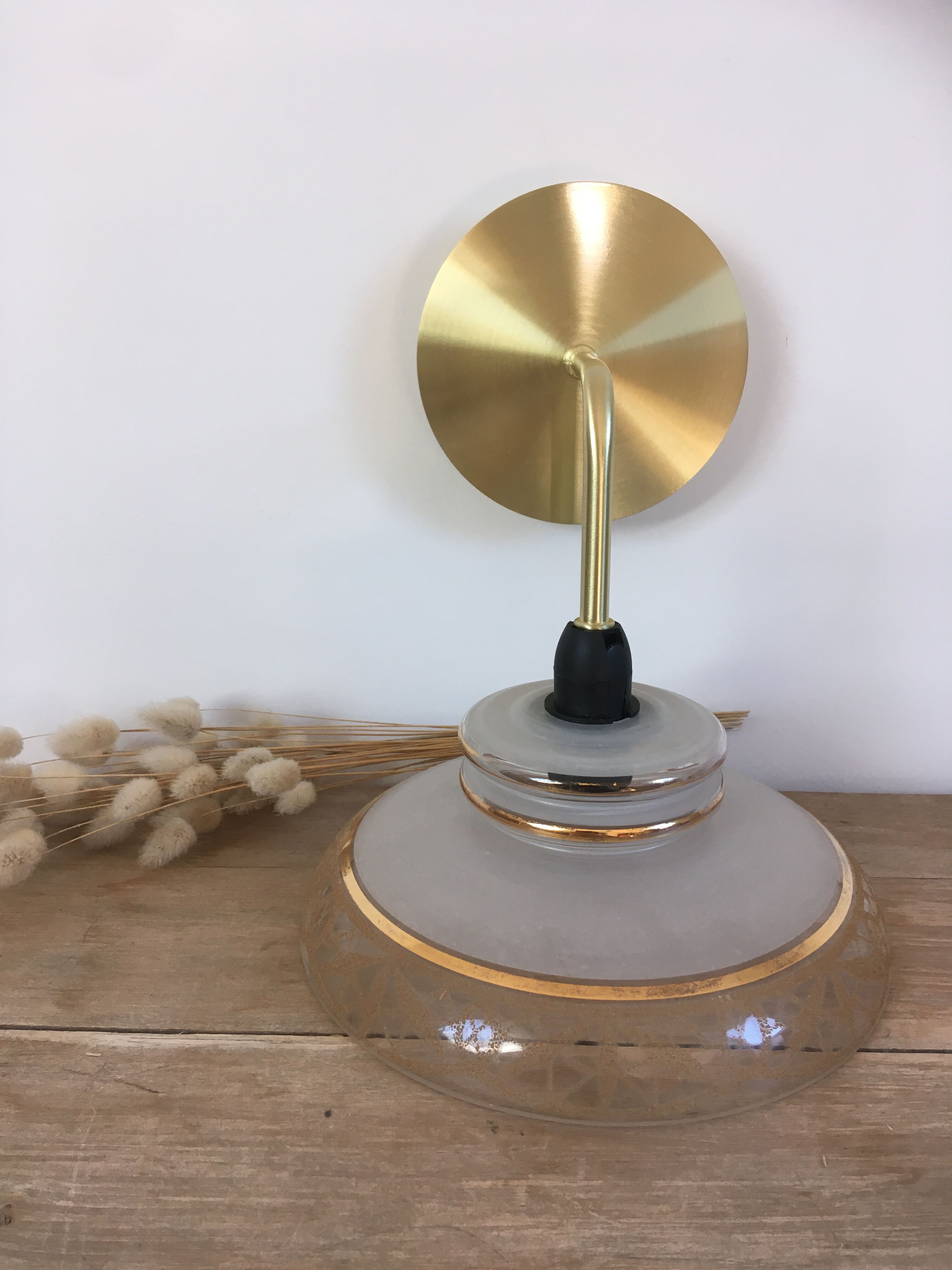 Vintage globe wall lamp in glass and brass base