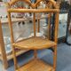 Corner shelf in rattan