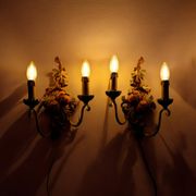 Pair of carved wood and metal sconces, Chelini FIrenze, Italy