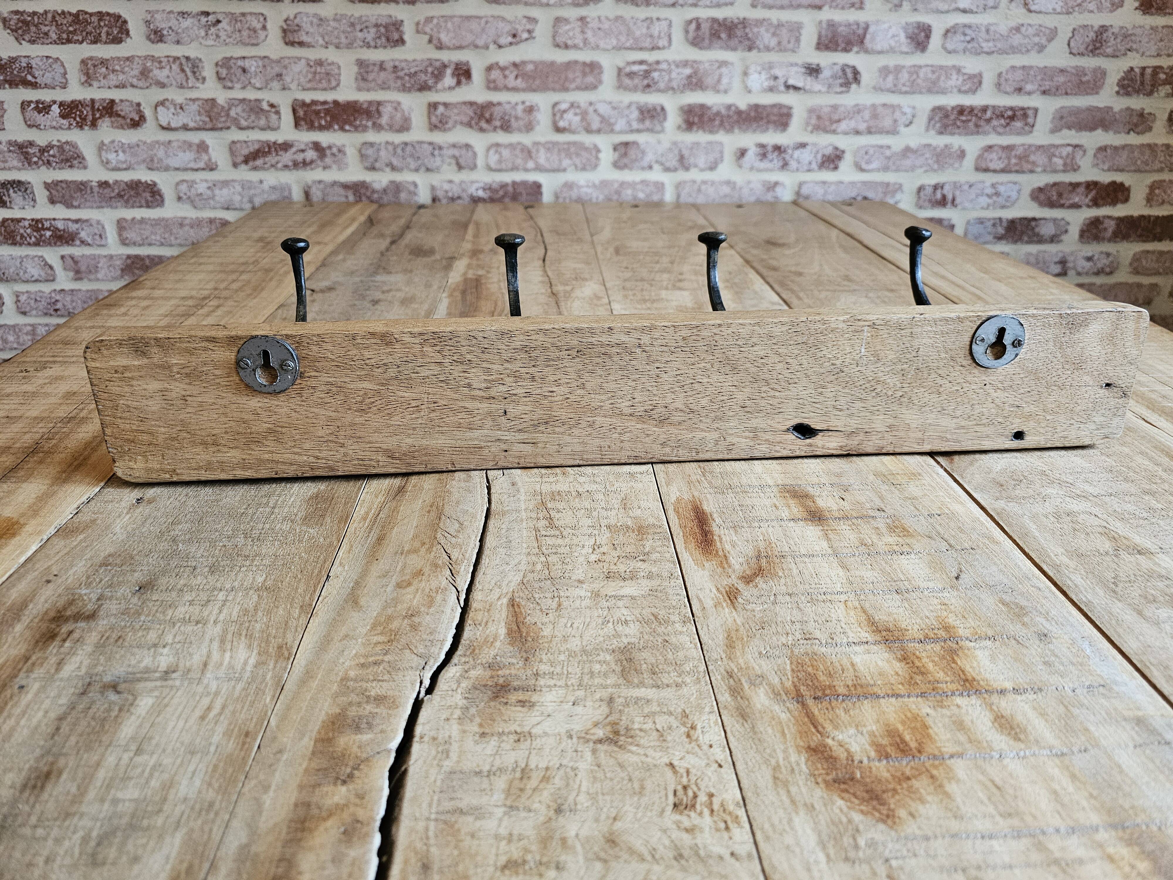 Solid teak coat hook with 4 double cast iron hooks