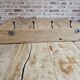 Solid teak coat hook with 4 double cast iron hooks