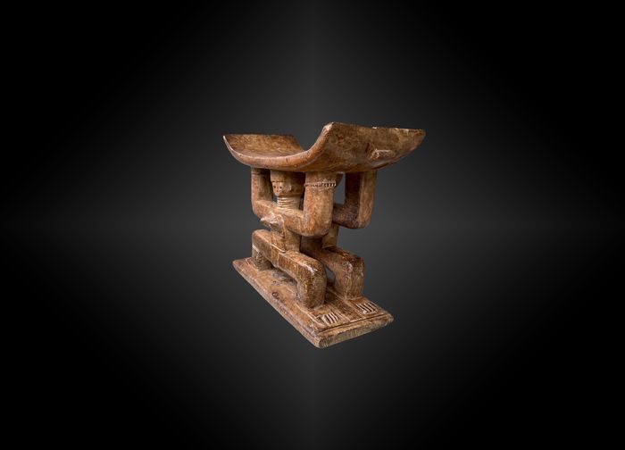 Seat featuring a caryatid couple ashanti culture, ghana