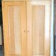 Rattan and wood wardrobe