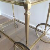 Brass rolling table from the Baguès house.