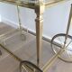 Brass rolling table from the Baguès house.